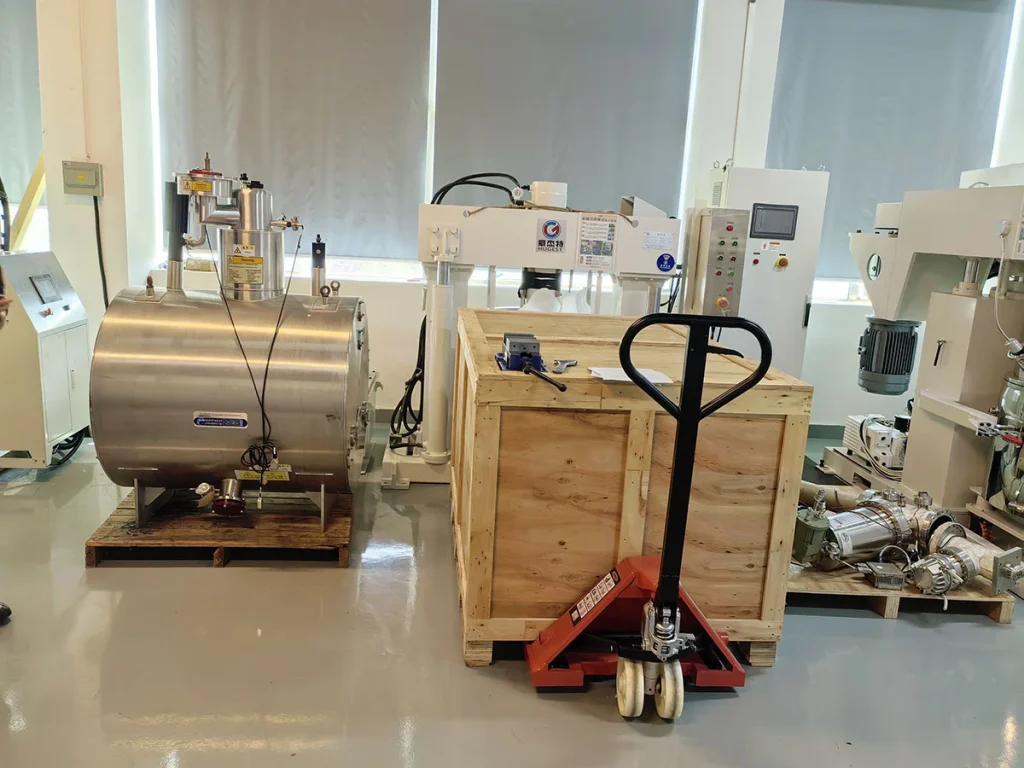 Complete set of industrial UV adhesive production equipment including stainless steel storage tank, vacuum double planetary mixer and extrusion homogenizer in clean production workshop